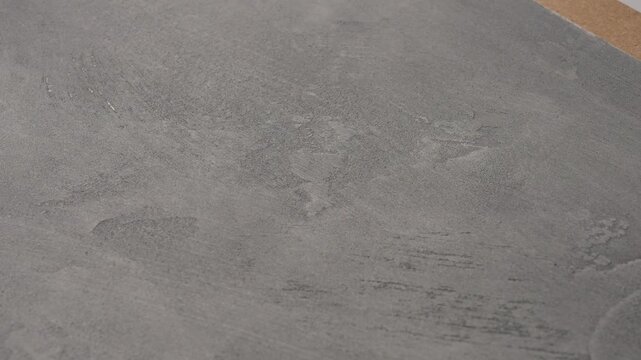 Textured Decorative Motif Appearing On Unfinished Concrete With Stencil And Brush Marks For Styling