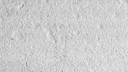 Fototapeta premium White watercolor paper background texture. Close up of a rough surfaced kraft paper flat-lay pattern
