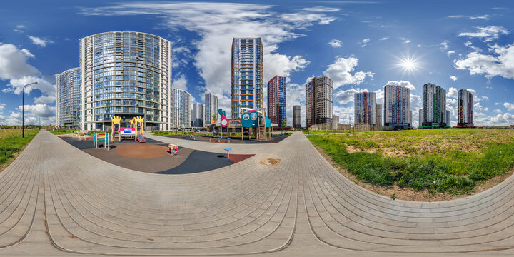 hdri 360 panorama near new skyscrapers and residential complex in full equirectangular seamless spherical projection