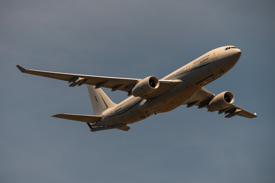 Military transport airplane. Military Transport Aircraft Flying in the Sky