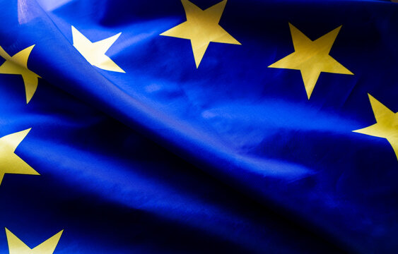 Close up European Union flag, Europe patriotic template, flyer for advertising, web background, banner, wallpaper poster.