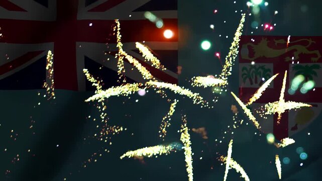 Bright colorful fireworks exploding in front of the national flag of Fiji during a festive celebration