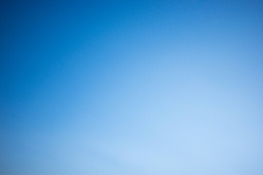 Blue abstract gradient background with smooth light and dark texture