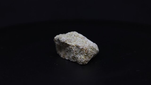 sandstone mineral from Italy with black background