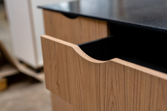 Bespoke oak cabinet with a black top