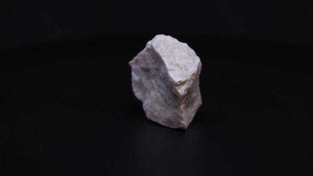 oolite mineral from Italy with black ackground