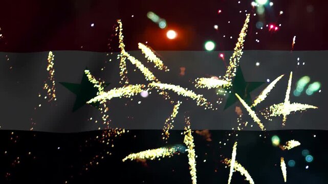 Bright golden fireworks exploding in front of the waving flag of Syria celebrating national independence day