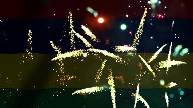 Bright golden fireworks exploding over the national flag of Mauritius for independence day celebration