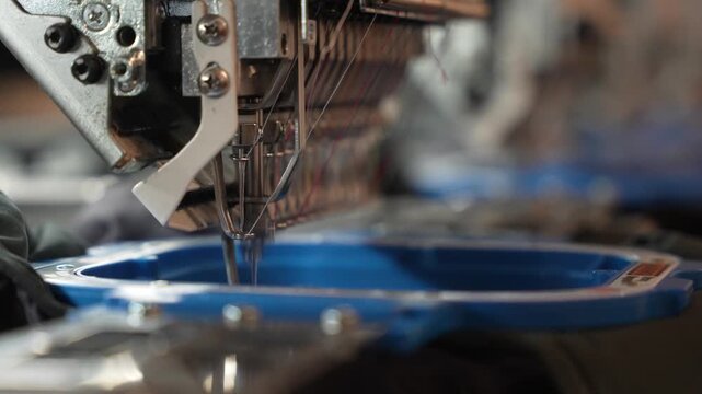 Embroidery machine stitching with blue thread