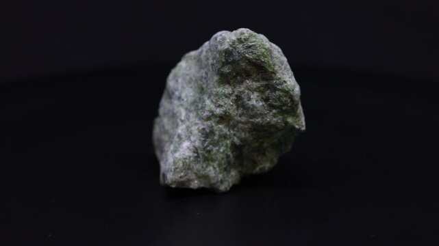 diopside mineral from Brazil with black background