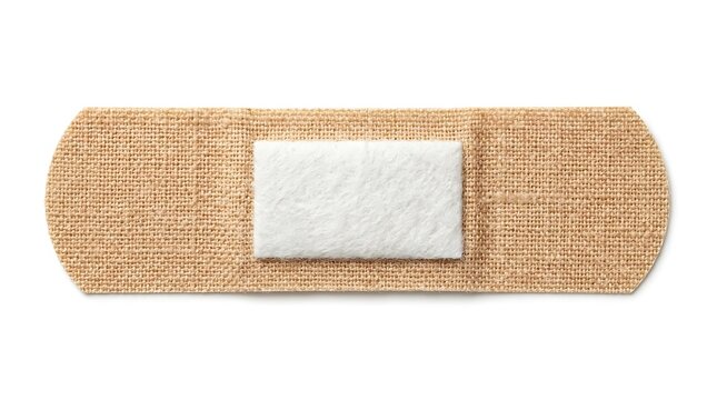 A single adhesive bandage strip for medical first aid use with a brown fabric texture and a sterile center pad