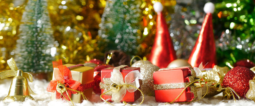 Banner Christmas present gift box under bauble christmas tree decorated holiday winter xmas. Panorama Present gift boxes to family kids decor in cozy living room copy space. Merry xmas happy new year