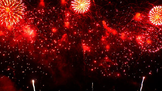 Red Firework celebrate anniversary happy new year 2026, 4th of july holiday festival. red firework in night time celebrate national holiday. Happy new year 2026, 4th of july holiday festival.