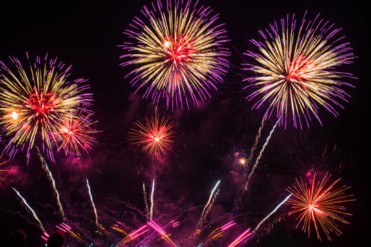 vibrant Colorful Firework celebrate anniversary happy new year 2027, 4th of july holiday festival. colorful firework night time to celebrate national holiday. countdown new year party 2026 background