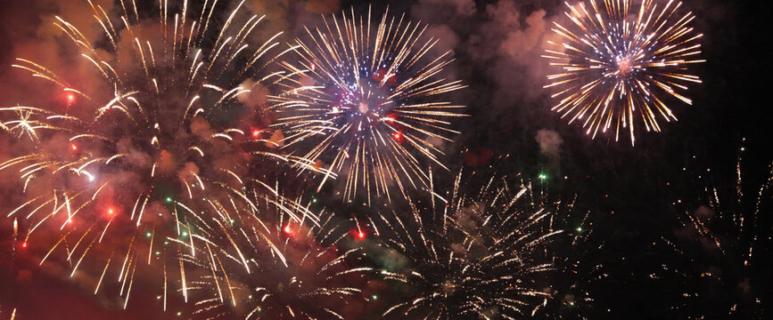 Colorful firework in night time to celebrate national holiday. countdown new year party background. Colorful vibrant Firework celebrate anniversary happy new year 2024, 4th of july holiday festival