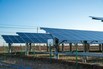 Solar Panel Arrays Installed On Open Ground Under Clear Sky © Xianshu