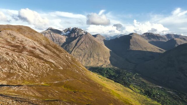 Aerial view of the Pap of Glencoe during sunset in the Scottish Highlands