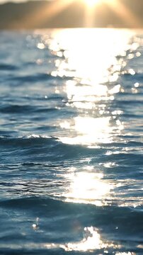 Sparkling Blue Water Surface with Bright Sunlight Reflections Background