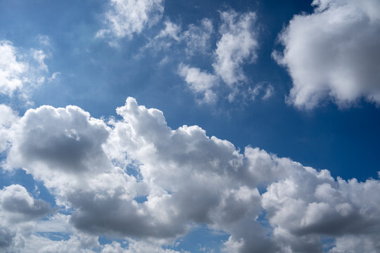 Bright Blue Sky Fluffy White Clouds In Daylight