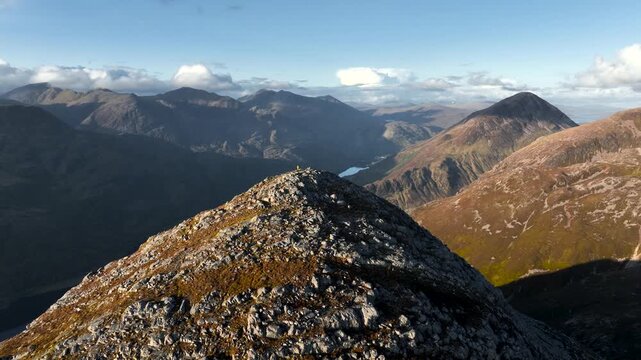 Aerial view of the Pap of Glencoe during sunset in the Scottish Highlands