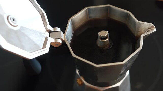 Coffee brewing inside a moka pot
