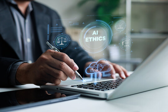 Business professional reviews AI ethics on a laptop with digital governance icons, highlighting legal compliance, transparency, accountability, responsible innovation and artificial intelligence polic