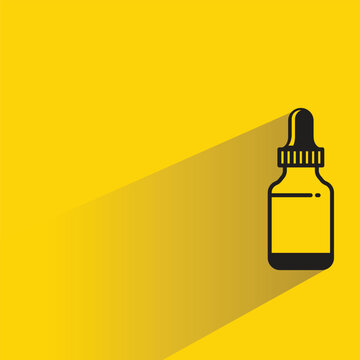 cosmetics serum bottle icon with drop shadow on yellow background