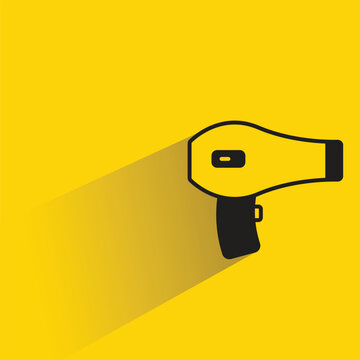 electric hair dryer icon with drop shadow on yellow background