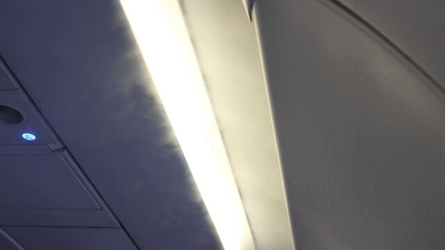 Water vapor pouring down from the air conditioning in the aircraft.