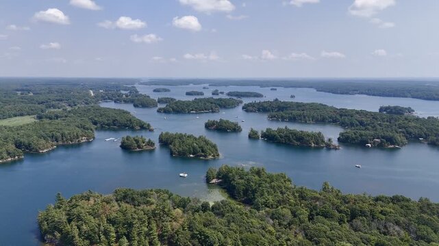 Aerial view of lush islands and blue water in the 1000 Islands region, St. Lawrence River, Canada. g