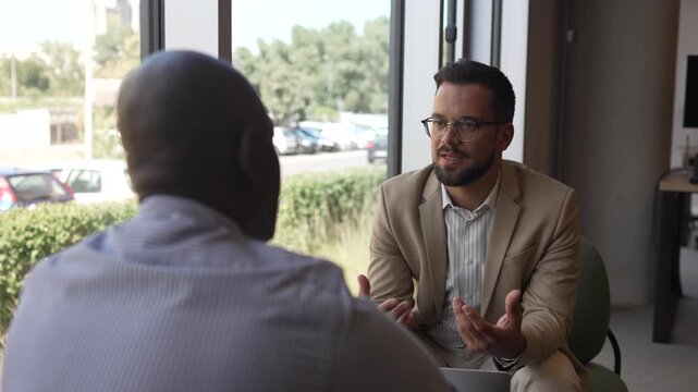 Professional businessmen talking during a job interview