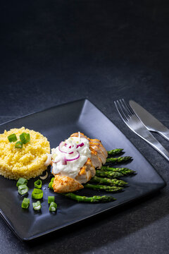 Green asparagus with grilled chicken fillet and couscous