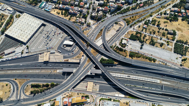 Aerial drone photo of popular multilevel highway junction overpass of Attiki Odos road, passing through Doukisis Plakentias Avenue with light traffic, Athens, Attica, Greece
