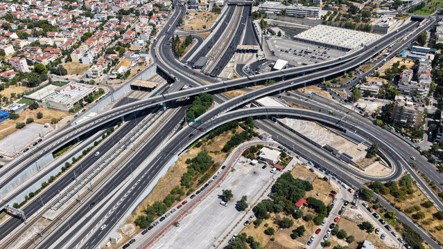 Aerial drone photo of popular multilevel highway junction overpass of Attiki Odos road, passing through Doukisis Plakentias Avenue with light traffic, Athens, Attica, Greece