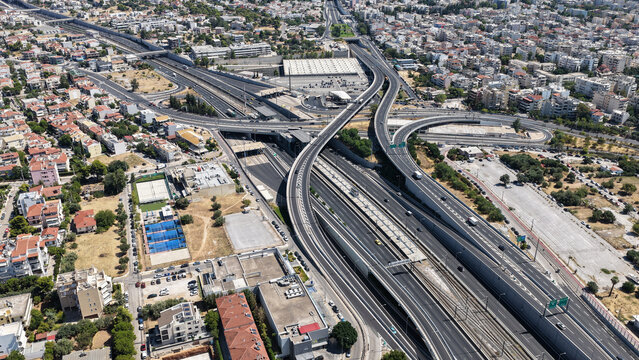 Aerial drone photo of popular multilevel highway junction overpass of Attiki Odos road, passing through Doukisis Plakentias Avenue with light traffic, Athens, Attica, Greece