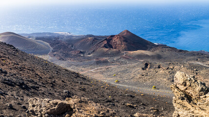 Panoramic vista over volcanic crater cones and lava fields in Fuencaliente, La Palma. © Jason Wells