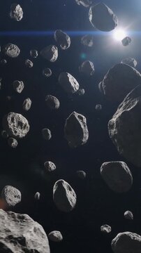 暗闇の宇宙空間を漂う無数の小惑星帯