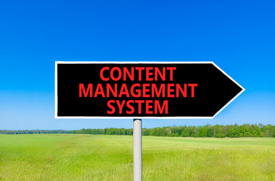 Content management system symbol. Concept words Content management system on beautiful black road sign. Beautiful blue sky grass background. Business content management system concept. Copy space.