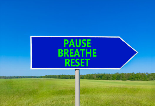 Pause breathe reset words symbol. Concept words Pause breathe reset on beautiful blue road sign. Beautiful blue sky background. Business support motivational pause breathe reset concept. Copy space.