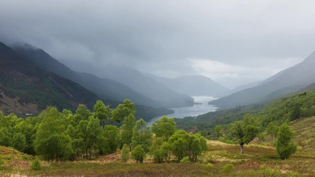 Dramatic mountain scenery with approaching stormfront in the Scottish highlands near Glencoe