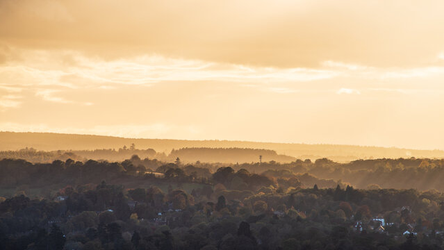 Beautiful Landscape image fo view from Box Hill in Surrey AONB during Autumn sunset