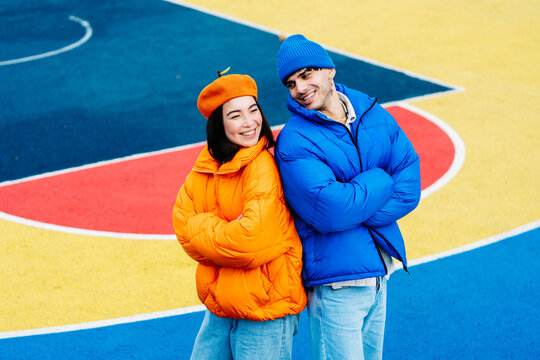 Multiracial young couple of lovers dating outdoors in winter