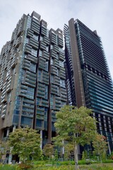 Modern residential towers with green terraces and trees, Singapore © Mary