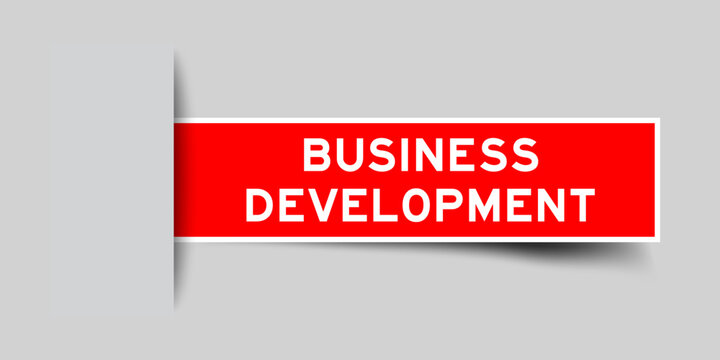 Red color square shape sticker label with word business development on gray background
