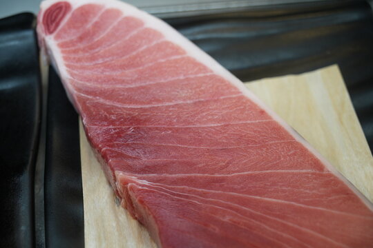 A close up shot of a high quality fresh otoro tuna fillet.