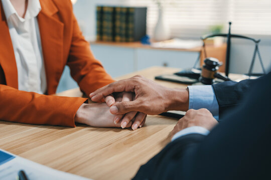 Lawyer offering client empathy and support during consultation