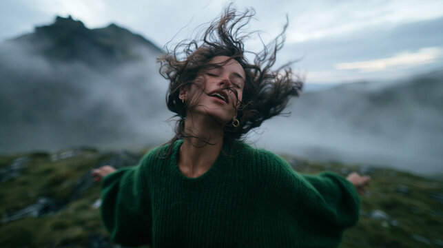 Free Spirited Woman Enjoying Fresh Mountain Breeze Outdoors
