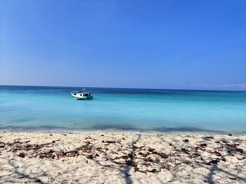 boat on the beach at Nuca Molas, Indonesia