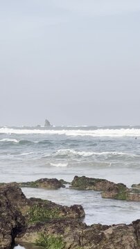 waves crashing on rocks