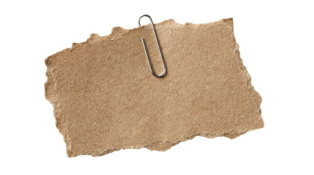 Torn piece of brown paper with a metal paperclip isolated on transparent background